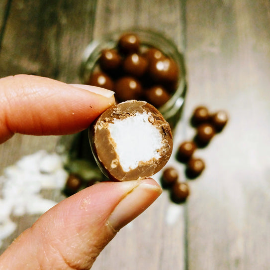 Coco Bañado en Chocolate de Leche